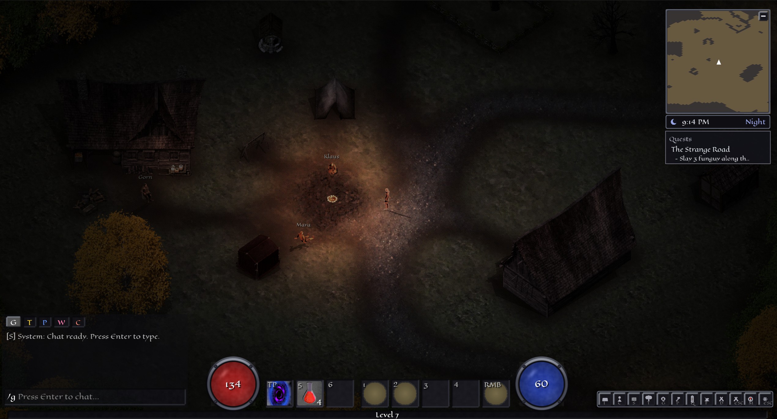 Oakvale Village at night, lit only by the campfire, with the quest tracker showing The Strange Road beneath the minimap